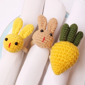 Handwoven carrot and bunny napkin rings set for festive dining table decoration
