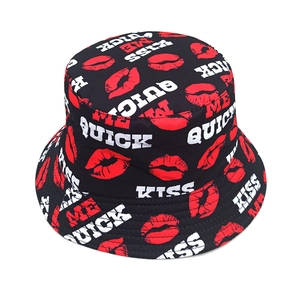 Fashionable reversible bucket hat with red lip prints and KISS ME QUICK lettering