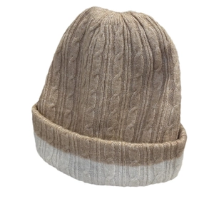 Two-tone khaki and white cable knit beanie hat with a cuffed brim for winter warmth