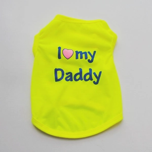 Detail of neon yellow dog vest featuring black I Love My Daddy print on polyester fabric