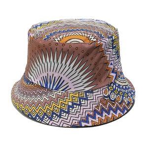 Close-up of geometric bohemian print on summer bucket hat with ethnic canvas texture