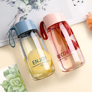 Portable aesthetic plastic water bottle with carry strap and fruit infusion design