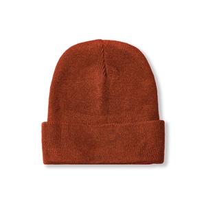 Detailed close-up of burnt orange knit beanie featuring a classic cuffed design and fine texture