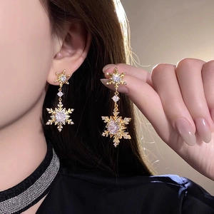 Elegant 18k gold plated snowflake dangle earrings with sparkling cubic zirconia crystals