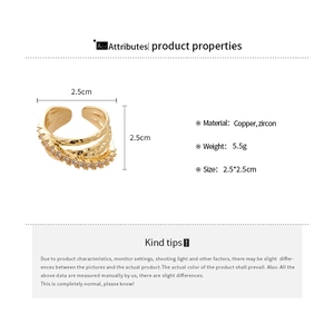Detail of three-layer cross ring with zircon inlay showing 2.5cm size and 5.5g weight