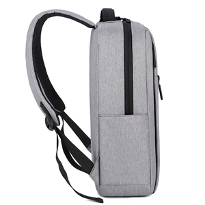 Minimalist grey business laptop backpack with USB charging port shown from a side view