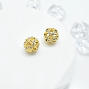 Squisite perle sferiche traforate placcate oro con micro-zirconi per creazioni fai-da-te