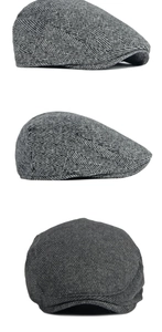 Détail de la casquette gavroche grise à chevrons montrant la texture et les coutures