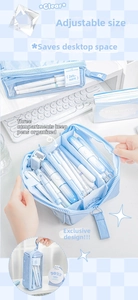 Detail view of light blue large capacity pencil case with three separate storage pockets