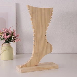 Bamboo foot-shaped display stand for sock shaping and jewelry necklace presentation