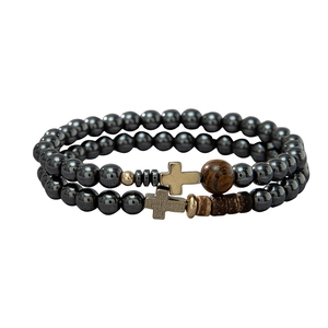 Men's hematite beaded bracelet set featuring wooden beads and metal cross charms on white