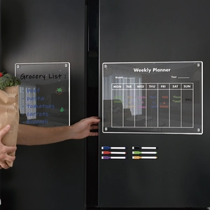 Detailed view of clear acrylic weekly planner and grocery list magnets for fridge