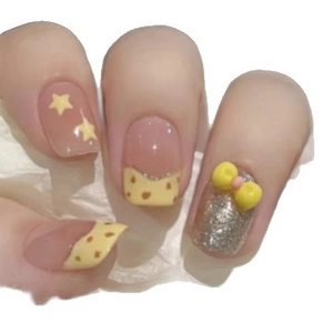 French press-on nails with yellow star and 3D bow in sweet minimalist design