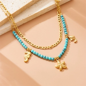 Gold double-layer necklace with turquoise beads and seahorse starfish fish pendants