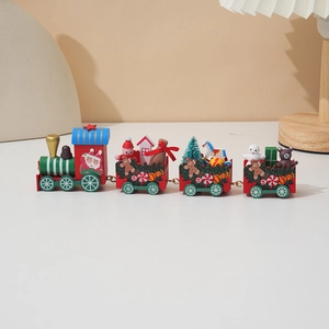 Close-up of a festive red wooden Christmas train with gingerbread men and snowmen ornaments