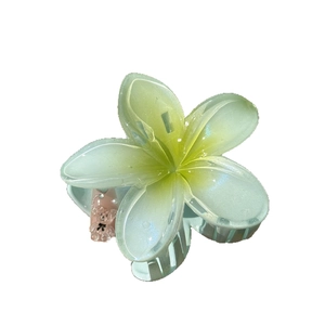 Translucent light green frangipani flower hair claw clip with pearl luster finish