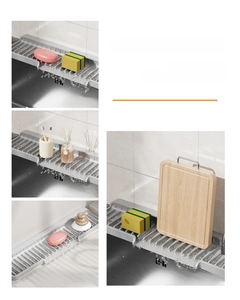Detailed view of grey silicone faucet mat with drainage ridges and cutting board holder
