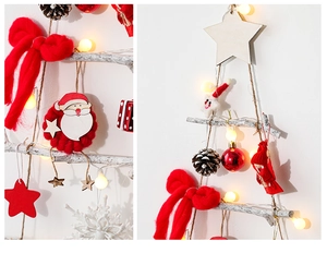 Detailed close-up of DIY wooden Christmas tree wall decor with bows and warm LED lights