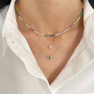 Three-layer gold necklace set featuring rainbow tennis chain and emerald zircon pendants