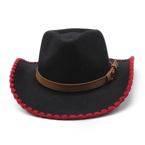 Detail of black felt cowboy hat with red stitched edge and brown leather belt trim