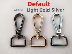 Detailed view of swivel snap hooks in gunmetal, light gold, and silver metal finishes