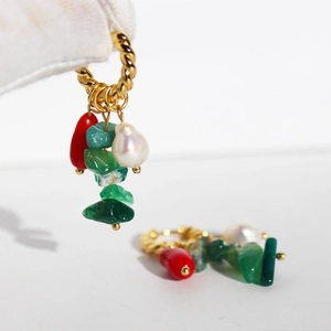 Handmade twisted gold earrings with red beads, green stones, and white baroque pearls