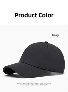 Detail of grey baseball cap showing breathable mesh fabric texture and stitching