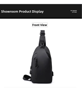 Front view of black water-resistant chest bag with matte finish and vertical zipper