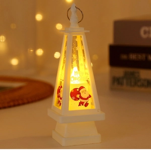 Detail of warm LED Christmas lantern with Santa Claus print and hanging ring
