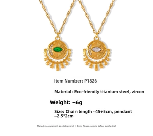Detailed view of bohemian gold plated titanium steel necklaces with eye and sun motifs