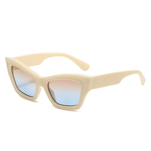 Classic cat eye sunglasses with beige frames and orange-blue gradient lenses in a white background
