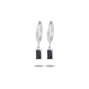 Detailed close-up of rectangle black zircon dangle earrings with silver steel finish