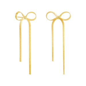 Detailed view of long 18K gold bow tassel earrings with a sleek ribbon snake chain design