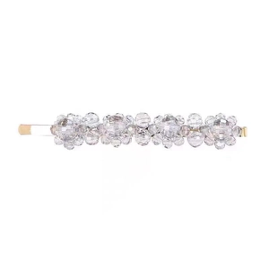 Elegant beaded crystal hair clip featuring floral patterns and gold-tone metal base