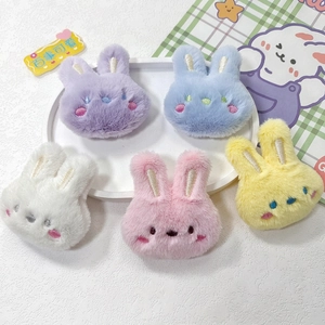 Set of five colorful plush rabbit doll brooches in pink, blue, purple, yellow, and white
