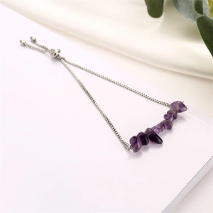 Detailed shot of amethyst gravel beads and stainless steel chain with ball accents