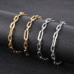 Detail of 3:1 ratio rectangular link chain necklace in gold and silver stainless steel