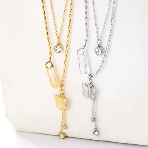 Detail of double-layer gold and silver butterfly pendant necklaces with zircon accents