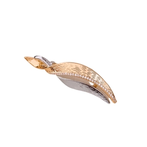 Elegant gold and silver leaf brooch with leaf-shaped design and cubic zirconia stones
