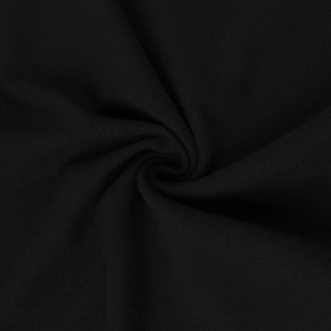 Macro detail of high-quality black knit fabric showing soft texture and fine stitching