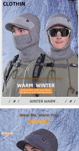 Detail of grey winter knit cap featuring integrated fleece lining and protective face mask