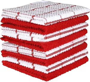 Stack of thick checkered cotton kitchen towels with red and white waffle weave texture