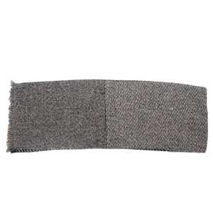 Detailed view of brown and gray tweed scarf with fringe edges on white background