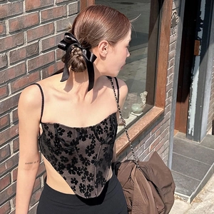Chic black floral flocked corset top with irregular hem and ballet style hair bow clip