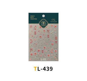 Detail of red flower nail stickers with gold vines and bows in TL-439 packaging