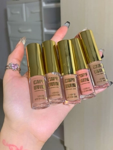 Detailed display of five matte liquid eyeshadow tubes held in hand for shade comparison