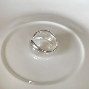Close-up of S925 sterling silver hallmark on the minimalist teardrop ring band