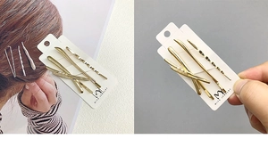 Detailed view of 3-piece gold pearl hair clip set on a white card with a model demo