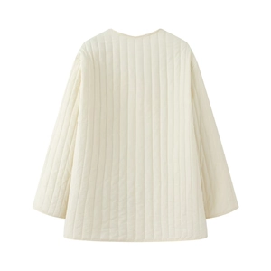 Detailed back view of cream quilted cotton jacket with vertical stitching patterns