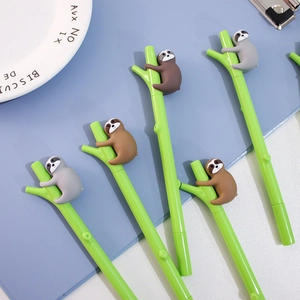 Detail of sloth-shaped pens on green branch bodies with grey and brown figures